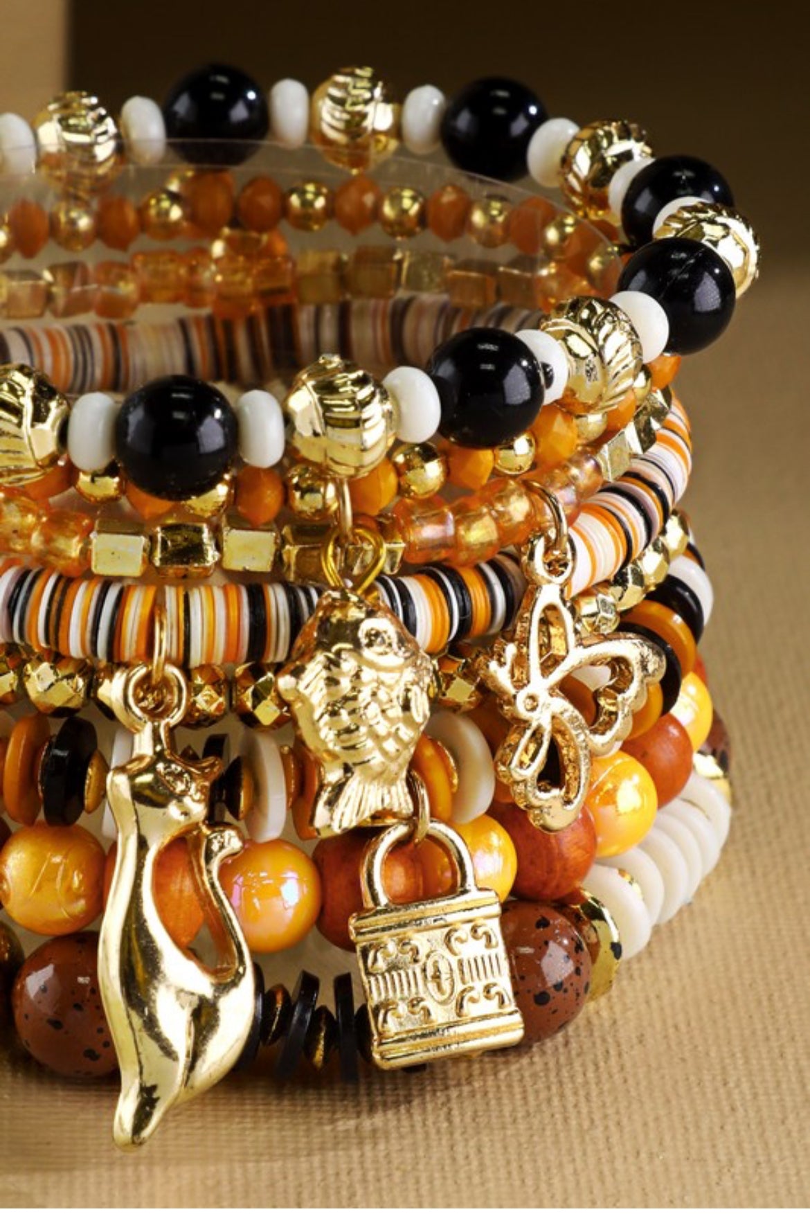 Layered multi bead charm bracelets
